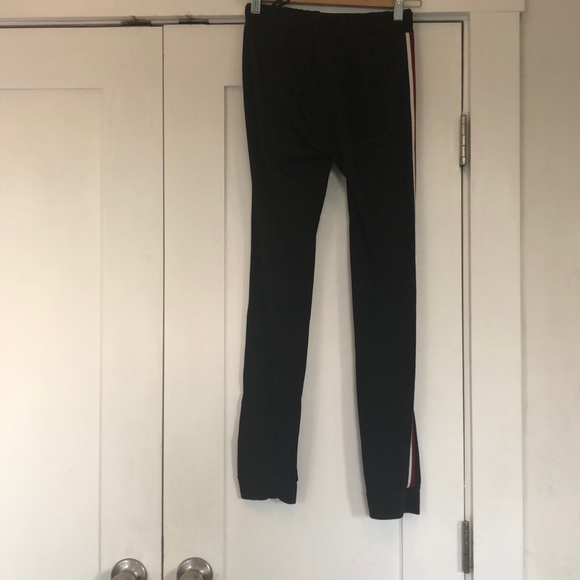 Black leggings with a red, white, and blue stripe - Picture 2 of 3